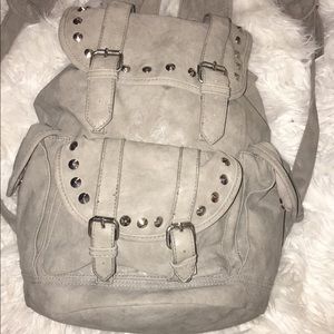 Xhilaration medium sized gray/ studded bookbag